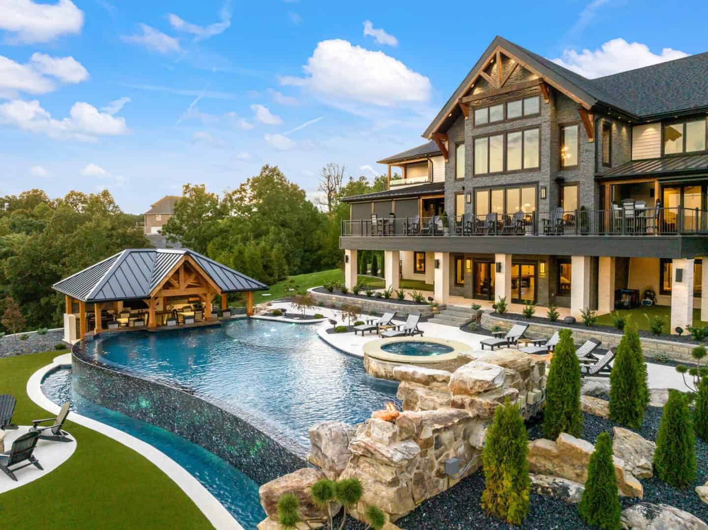 Elegant mountain-style log home with natural materials, blending rustic charm with modern luxury in.